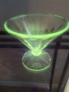 Vintage ribbed footed glass sherbet dish with silver trim.